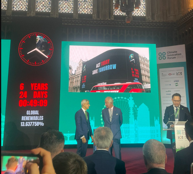 Image of Sadiq Khan and King Charles activating a climate countdown clock the Climate Innovation Forum in London.