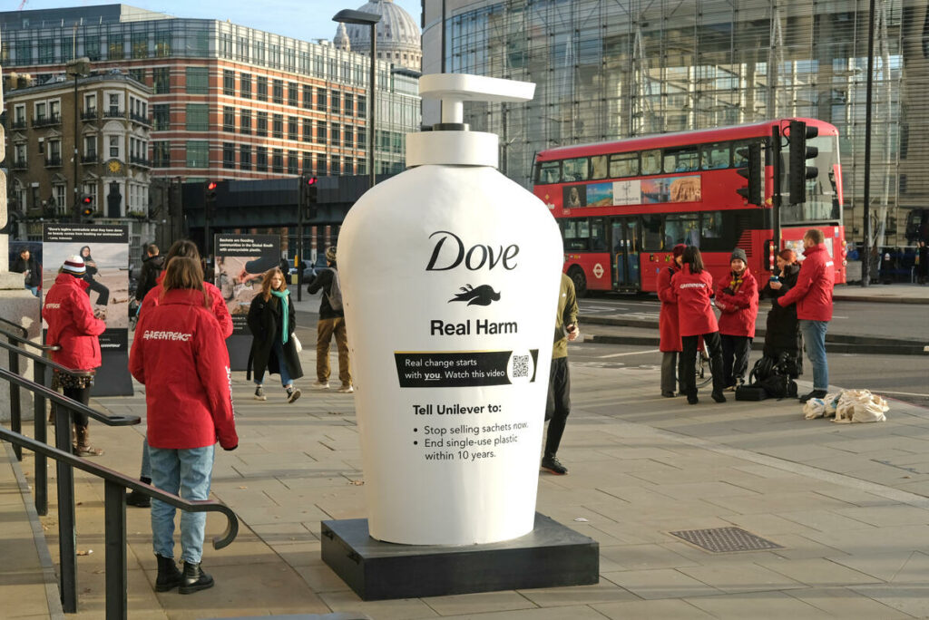 Greenpeace have planted a subversive redesign of the iconic Dove branding outside Unilever’s headquarters