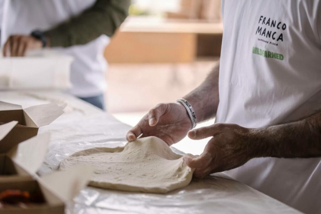 Franco Manca is teaming up with regenerative food company Wildfarmed to roll regeneratively farmed flour in all 69 of its restaurants nationwide.
