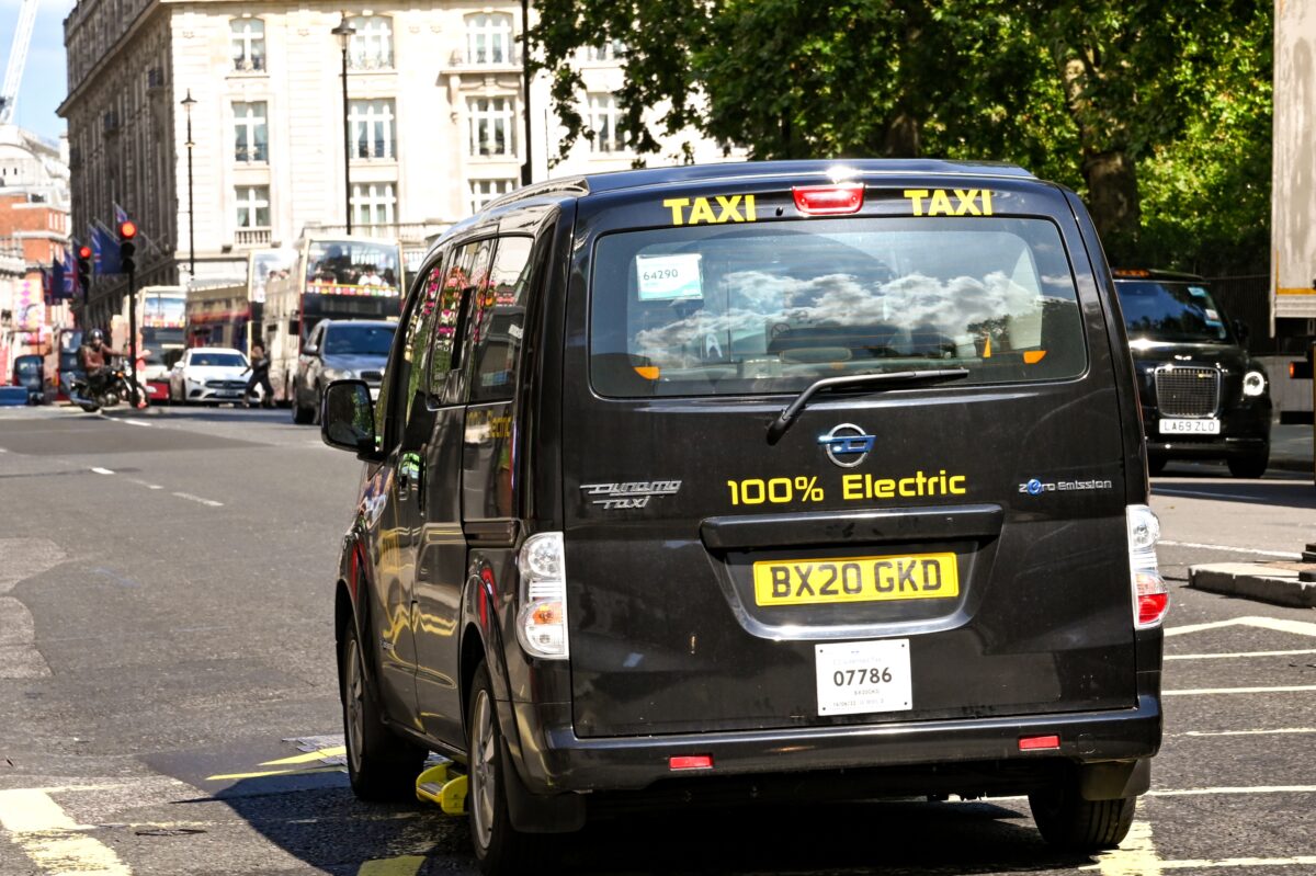 Image of electric Addison Lee vehicle on a London street. London’s biggest minicab company Addison Lee has U-turned on plans for its cars to be zero emissions this year.